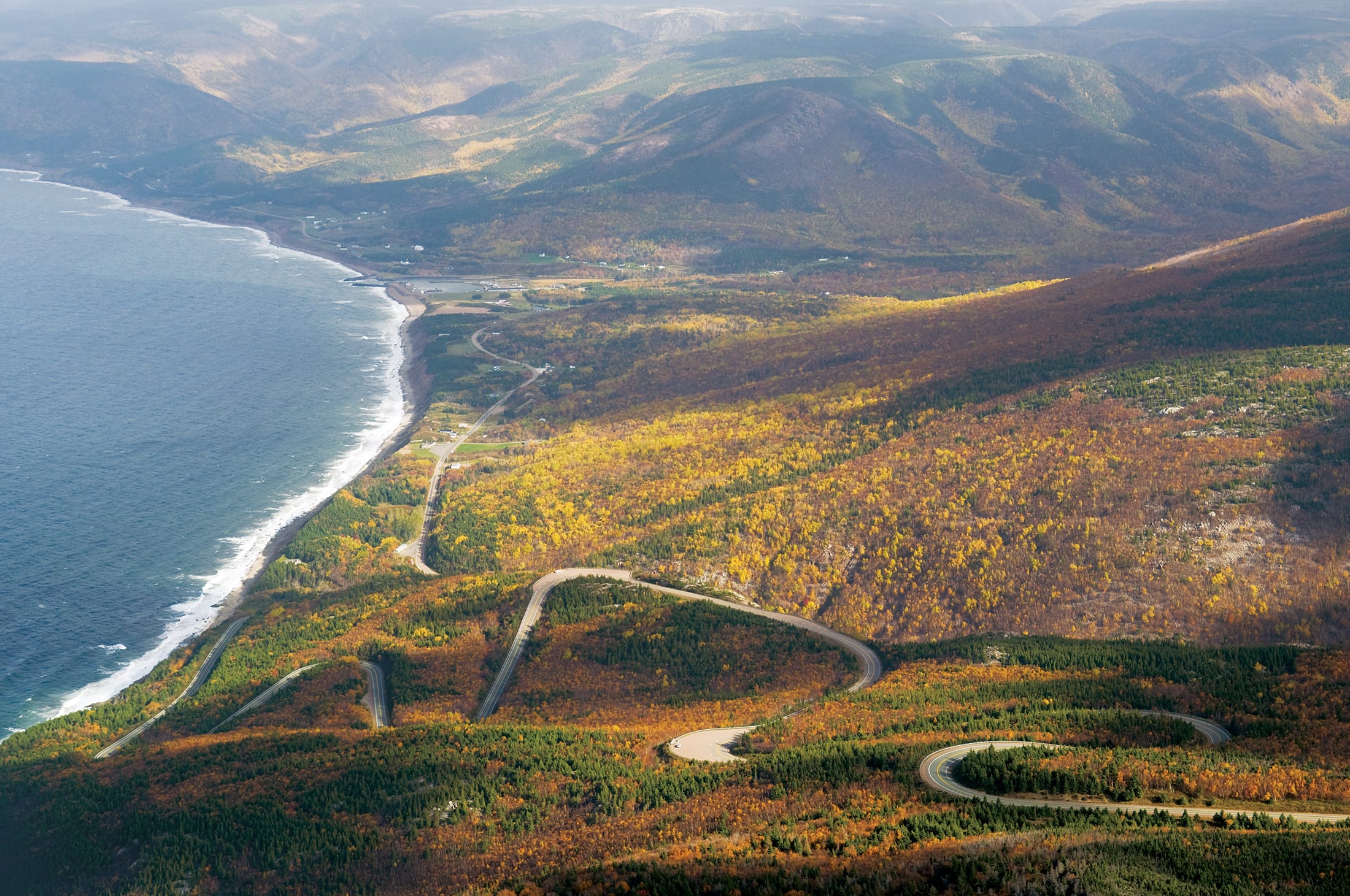 A twisting, turning highway hugs the coast