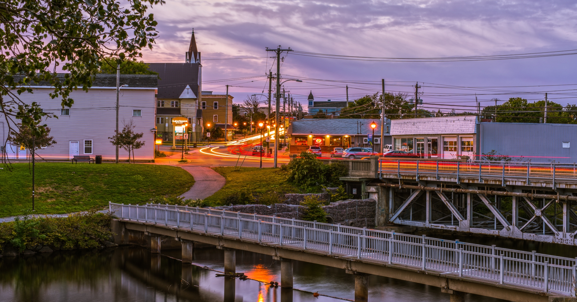 Scenic sunset view of Glace Bay, Cape Breton Island, with warm hues lighting up the town and coastline.